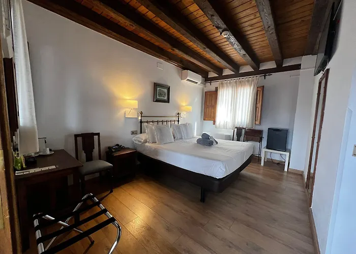 Отель Hospedium Rural Abadia De Yuste 5*